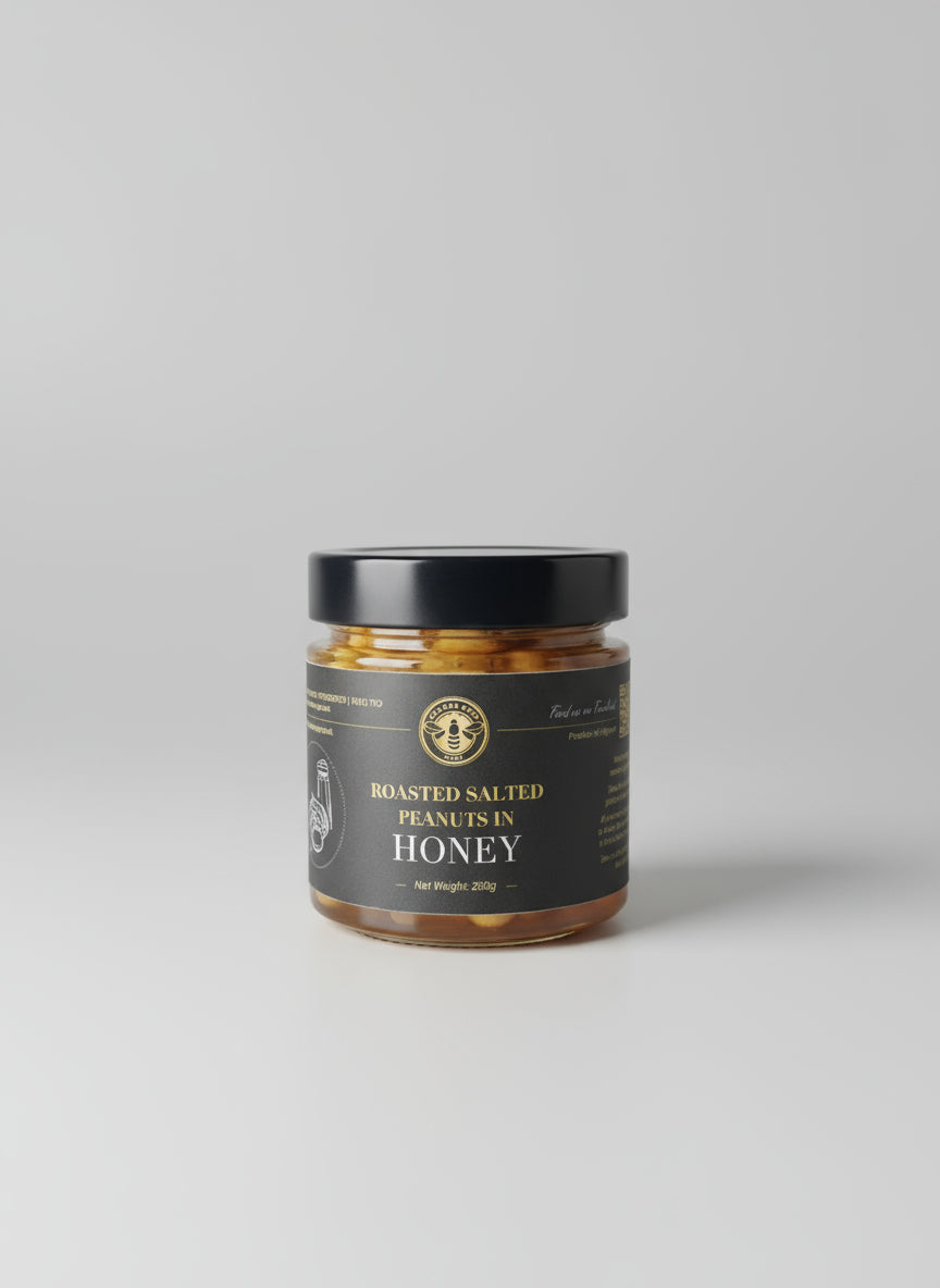 Jar of roasted salted peanuts in honey on a kitchen counter